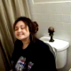 A black girl films her Hispanic girlfriend pooping on the toilet. The camerawork is a bit shaky, but you can hear the pooping if you listen carefully as she instructs us to do.